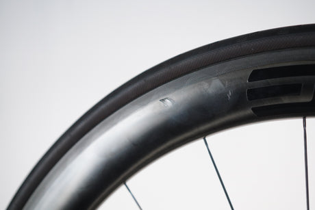 *Damaged* FRONT ENVE 5.6 Carbon Tubeless Clincher Chris King R45 Rim Brake Wheel